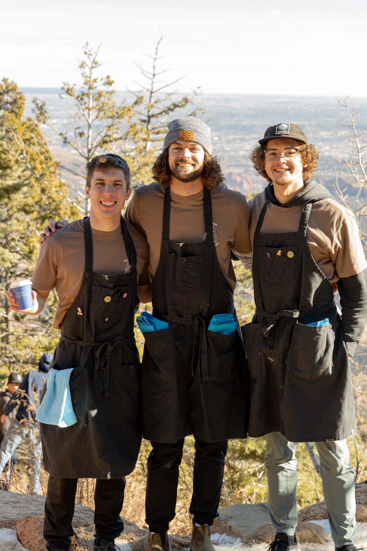 Tom, Jared, and Ryan in aprons